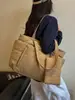 Bolso tote de color liso, estilo suave y relajado, moda coreana para chicas jóvenes, adecuado para el uso diario y salidas de vacaciones, un bolso casual