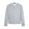 Camiseta de manga larga estilo retro americano de dos piezas falsas con cuello Henry para hombre y mujer, corte holgado, bloques de color, top informal, versátil y moderno