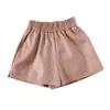 Pantalones cortos de cuero personalizados para mujer, otoño e invierno, nuevos, de cintura alta, adelgazantes, de talla grande, con botas sueltas y pantalones cortos de cuero de imitación y pierna ancha.