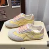 Tênis Esportivo Casual Retro com Cadarço Feminino 2026 Primavera Novo Versátil Solado Plano Treinamento Alemão Sapatos Forrest Gump Tênis Esportivo Color Block