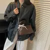 Bolso de textura tejida para mujer 2026 nuevo otoño popular nicho bandolera cruzada bolso de mano pequeño para salidas super caliente exquisito