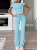 Comercio exterior transfronterizo Ropa europea y americana para mujer Primavera y verano 2024 Traje de moda de color liso con cuello redondo, temperamento urbano de ocio