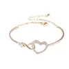 Bestseller transfronterizo de Amazon: Pulsera abierta con forma de corazón de circón hueco, estilo versátil de lujo ligero, joyería de alta gama para parejas para mujer