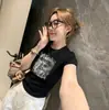 Camiseta Impresa Estilo Retro Americano para Mujer Verano 2026 Ajuste Delgado Versátil Moderna de Manga Corta