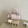 Bolso de Mano Moda Primavera Bolso Tote Pequeño para Mujer 2026 Nuevo Bolso Sencillo Tipo Almohada Bolso de Hombro Cruzado Versátil Bolso para Teléfono Móvil
