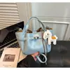 Bolso plisado coreano para mujer, nuevo y moderno de moda de verano 2026, bolso tipo cesta con cierre, bolso cruzado versátil