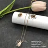 Conjunto de pendientes y collar Xuping estilo vintage de nicho europeo y americano transfronterizo, conjunto de joyería elegante de aleación de cobre, venta al por mayor y hecho a medida