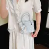 Bolsa de bolinhas de verão transfronteiriça super popular de nicho para mulheres 2026 nova moda versátil bolsa transversal bolsa de mão para o trabalho bolsa feminina