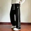 Calças casuais de primavera e outono para homens, novas calças de moletom largas de perna reta com estrelas, calças esportivas grossas listradas da moda