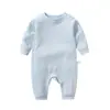 Mono de bebé de color puro para primavera y otoño con broche en el hombro de manga larga para bebé niño y niña de algodón de una pieza con pierna larga venta directa de fábrica