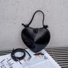 Bolso Love para mujer primavera y verano 2025 nuevo cuero corazón de durazno bolso de hombro en forma de corazón bolso bandolera outlet de fábrica de Guangzhou