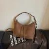 Bolso de axila retro de nicho estilo coreano para mujer, nueva colección otoño 2026, bolso cruzado elegante, bolso de hombro casual para el día a día
