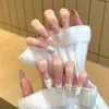 Unhas Postiças Vestíveis em Rosa Nude com Corrente de Miçangas de Laço Doce de Gato, Estilo Curto, Unhas Postiças Feitas à Mão Olho de Gato Francês Fofo