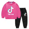 Conjunto de Roupas Infantis Novo para Primavera e Outono de 2026 do Tiktok: Conjunto de Duas Peças com Moletom e Calça Longa para Crianças, Conjunto de Manga Longa 100% Algodão