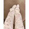 Pantalones blancos con estampado de oso para mujer 2023 nuevo popular diseño de primavera y otoño sentido de nicho rectos de pierna ancha tipo mopa