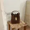 Bolso bandolera para mujer con diseño retro de nicho transfronterizo y patrón tejido, bolso tipo cubo de mano moderno, sencillo y elegante