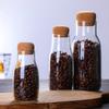 Fábrica al por mayor, tarro de vidrio para almacenar granos de café, tarro de vidrio para té perfumado, tapa de corcho sellada transparente, tarro de té perfumado