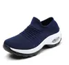Comercio electrónico transfronterizo al por mayor zapatos de mujer talla grande zapatillas con amortiguación de aire tejido fly zapatos calcetín zapatos casuales de comercio exterior