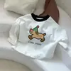 Nueva camiseta base de manga larga para niños 2026 nuevo estilo unisex color block para bebé cuello redondo camiseta top de corazón de dibujos animados primavera y otoño