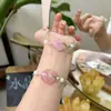 Pulsera tejida hecha a mano estilo chino original para DIY con cristal rosa natural, jade Hetian y ágata, con un lindo diseño de caricatura