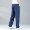 Calça Jeans Tencel Xintang Guangzhou para Homens, Novo Estilo Outono, Calça Reta Solta Azul Claro, Calça Masculina de Seda Gelada, Super Nova