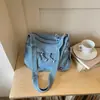 Bolsa de Hombro Cruzada de Moda Plegada Ligera de Gran Capacidad para Viajes Transfronterizos Verano 2026 Bolso Simple Casual para el Trabajo