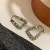 Nuevos aretes elegantes de alta gama con hebilla para la oreja, celebridad de Internet, lujo ligero de nicho, flash, diamante, plata rota, aretes geométricos