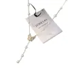 Collar de Concha de Perla con Borla de Mariposa de Flor para Mujer 2026 Nuevo de Alta Gama Lujo Ligero Nicho Cadena para Clavícula Tendencia
