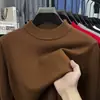 Suéter de cuello alto cruzado al por mayor para hombre, nuevo estilo otoño e invierno 2026, camiseta básica de punto versátil de color liso para hombres de mediana edad