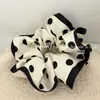 Elástico Elegante de Lunares Blanco y Negro Estilo Francés con Volantes y Acabado de Alta Gama, Diadema de Moda para el Trayecto al Trabajo, Accesorio para Cola de Caballo para Mujer