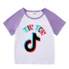 2026 Nova Roupa Infantil Verão Camiseta de Manga Curta para Meninos e Meninas, Camiseta Base Raglan, Camiseta de Meia Manga para Bebê, Top Infantil