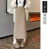Saia feminina de malha branca para outono e inverno de 2026, estilo novo, forrada com fleece, espessa, comprimento médio, com fenda, cintura alta, saia evasê modeladora