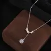 Collar de Flor de Jazmín de Plata de Ley 999 para Mujer Accesorio de Moda Cadena Clavicular de Nicho Colgante de Calcedonia Collar con Borla