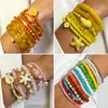 Conjunto de pulseiras de férias estilo boêmio transfronteiriço europeu e americano, pulseira multicamadas com sementes, concha e estrela-do-mar