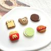 Nuevas y lindas galletas, pan, simulación de comida, juego de resina, accesorios, zapatos con agujeros, crema, accesorios de goma, venta al por mayor