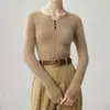 Otoño/Invierno 2026 Nuevo Suéter de Cachemira Cuello Redondo Manga Larga Botones Color Sólido Corte Delgado Favorecedor Top Base