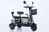 Triciclo eléctrico doble tres asientos pequeño scooter para mujeres para recoger a los niños en casa coche de batería para niños