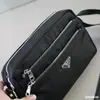 Bolso de hombro informal de tela oxford impermeable para hombre y mujer, diseño de triángulo p family, bandolera multicapa, bolso de mano para niña, casual