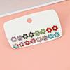 Aretes de Diamantes de Mariposa y Flor de Color de Venta Caliente Transfronteriza de 16 piezas, Adecuado para Dulce Nicho Joker Simple Aretes Delicados