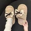 Pantuflas esponjosas de suela plana con lazo de alta gama para mujer, elegantes y versátiles para usar en exteriores, pantuflas de algodón otoño/invierno 2026, diseño nuevo y moderno