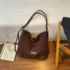 Otoño 2026 Nuevo Elegante Nicho Retro Bolso de Mano de Gamuza Gran Capacidad Sensación de Alta Gama Bolso de Hombro Único Cruzado