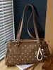Bolso de hombro de lunares estilo coreano transfronterizo para mujer, nuevo bolso de axila de moda otoño 2026, bolso de mano de nicho y elegante