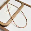 Producto Nuevo Más Vendido: Collar de Acero Titanio Arena Dorada con Perlas de Circonita Arena Azul y Cadena de Clavícula de Cristal para Mujer, Collar Único y Versátil