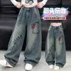 Ropa de Otoño para Niñas Estilo Coreano Pantalones de Mezclilla de Gato de Dibujos Animados 2026 Nuevas Llegadas de Otoño Pantalones Anchos Estampados Súper Elegantes para Niños