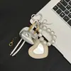 Lindo Colgante de Bolso de Gato de Dibujos Animados Femenino Llavero Versátil de Personalidad Creativa Exquisito Accesorio Colgante de Espejo