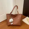 Bolsa Feminina Casual para o Dia a Dia Grande Capacidade 2026 Nova Bolsa Tote de Outono Estudante Universitário Estilo miu Bolsa de Ombro Único Tendência Feminina