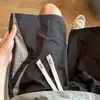 Shorts casuais de secagem rápida de seda fina de gelo de verão masculino estilo americano na moda da marca de quatro pontos calças soltas roupas externas plus size calças de cinco pontos