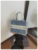 Bolso de mano grande de estilo coreano para el verano de 2026, bolso cuadrado pequeño texturizado de moda, bolso cruzado de nicho para mujer transfronterizo