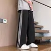 Pantalones deportivos estilo americano para hombre al por mayor transfronterizos, pantalones de chándal de verano con rayas laterales, pantalones casuales para hombres y mujeres, pantalones de pierna ancha de moda