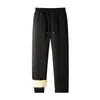 Pantalones térmicos de lana de cordero con calefacción eléctrica de grafeno para invierno transfronterizos para hombres, con forro polar extra y diseño engrosado, protección contra el frío en las rodillas para personas de mediana edad y mayores